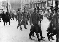Berlin, 1 May 1929. Unrest after the Socialist government in Prussia bans May Day demonstrations.  Berlin police with arrested demonstrators.  Photo. [AKG110392333]
