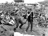 Woburn Abbey. 27th August 1967. The dances of the "Flower People " as performed by two hippies, with their bells, bangles and beads jangling, at the Festival of the Flower People, a three day "love in" being held in the grounds of Woburn Abbey [PST110004379]