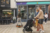 England, Hampshire, Winchester, The High Street, Street Scene with Family passing by [STV110084002]