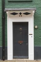 England, Hampshire, Winchester, Colourful Doorways in Historic Colebrook Street [STV110084020]