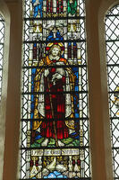 England, Hampshire, Winchester, The Chapel of St.John's Hospital, Stained Glass Window depicting St John the Baptist Holding the Lamb of God [STV110084038]