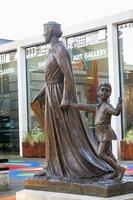 England, Hampshire, Winchester, Licoricia of Winchester and her Son Asher Statue by Ian Rank-Boadley Sculpture [STV110084042]