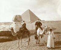 In front of the Sphinx and the Cheops pyramid on the Giza plat.. [PHT110262224]