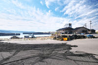 仮復旧した鹿磯漁港 [TMA110070832]