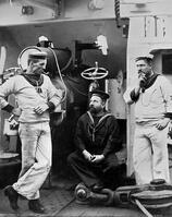 Three petty officers on board the cruiser HMS 'Theseus', 1896. The 'Theseus' was launched in 1892. A print from The Navy and Army Illustrated, 21st August 1896. [TPG110085021]