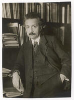 Albert Einstein (1879-1955), theoretical physicist, philosopher and author. Seen here in front of bookshelves.  [TPG110085090]