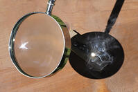 Magnifying Glass Concentrating Sunlight and Generating High Temperatures [TPG110085127]