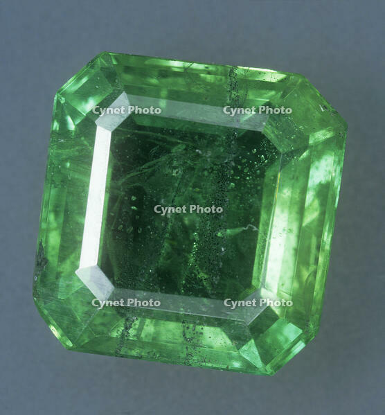 Kornerupine (magnesium aluminum iron boro-silicate hydroxide) is a rare boro-silicate mineral which occurs in a range of greens and browns - this emerald colour is exceptional. [TPG110085110]