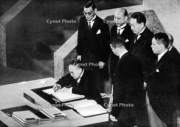 Photograph showing Shigeru Yoshida, the Japanese Premier, signing the Peace Treaty at San Francisco, 4th September 1951.  [TPG110085159]