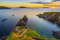 Ireland, Co.Kerry, Dingle, Slea Head, Dunquin Pier towards Blasket Islands at sunset [AWL110001555]