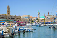 Israel, North District, Upper Galilee, Acre (Akko). Khan al-Umdan, Sinon Basha Mosque and buildings in the old town from Akko harbor. [AWL110001684]