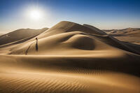 Single person walking over sand dunes near Swakopmund, Namibia [AWL110001695]