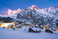 M?rren, Berner Oberland, canton of Bern, Switzerland. The village with Eiger, M?nch and Jungfrau in the backdrop at dusk [AWL110001720]