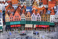 Belgium, West Flanders (Vlaanderen), Bruges (Brugge). Elevated view of the medieval guild houses and restaurants on Markt square [AWL110001902]