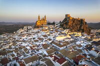 Traditional white village of Olvera with the cathedral and the castle seen at sunrise, drone picture, Andalusia, Spain [AWL110001906]