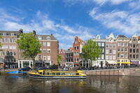 Boats and typical houses on Prinsengracht canal, Amsterdam, Netherlands [AWL110002039]