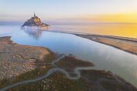 High tide surrounds Mont Saint-Michel at sunrise, aerial view, UNESCO World Heritage Site, Normandy, Manche, France [AWL110002088]