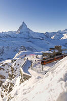 Train station of Gornergrat with view on Matterhorn and ski slopes. Gornergrat, Zermatt, Canton of Valais / Wallis, Switzerland. [AWL110002137]