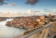 Porto at sunset with a train on Louis I8 bridge on Douro River. Oporto city, Porto district, Portugal, Europe [AWL110002234]