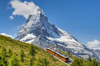 Train along the Gornergrat mountain rack railway with Matterhorn in the foreground, Zermatt, Valais, Switzerland [AWL110002256]