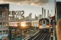 USA, New York City, the train 7 approaching an elevated station in Queens with Manhattan in the background [AWL110002263]