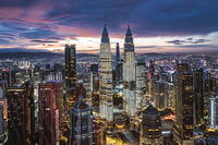 Aerial view of KLCC skyline with Petronas Twin Towers at dawn, Kuala Lumpur, Malaysia [AWL110002457]