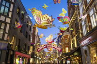 Christmas decorations, Carnaby Street, Soho, London, England, UK [AWL110002521]