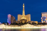 Paris Las Vegas Hotel and Casino with the Bellagio Fountains at dusk,  Las Vegas, Nevada, USA [AWL110002550]