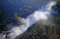 Zambia, Victoria Falls. Aerial view of the Zambezi River as it plummets over the Victoria Falls, which span the border between Zambia and Zimbabwe [AWL110002586]