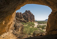Chad, Wadi Archei, Ennedi, Sahara.  A huge sandstone cave with a view down Wadi Archei. [AWL110002603]