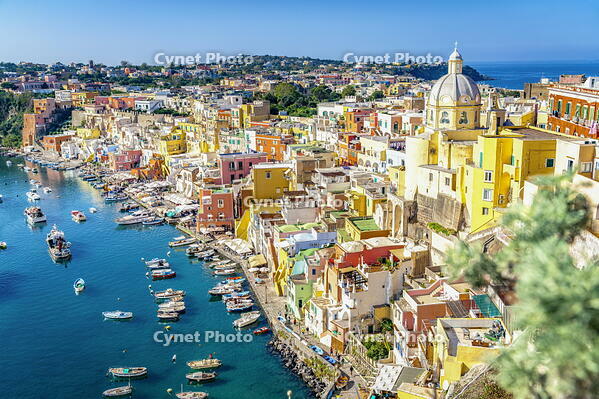 Clear sky over Procida island and harbor overlooking the crystal clear sea, Gulf of Naples, Campania, Italy [AWL110000439]