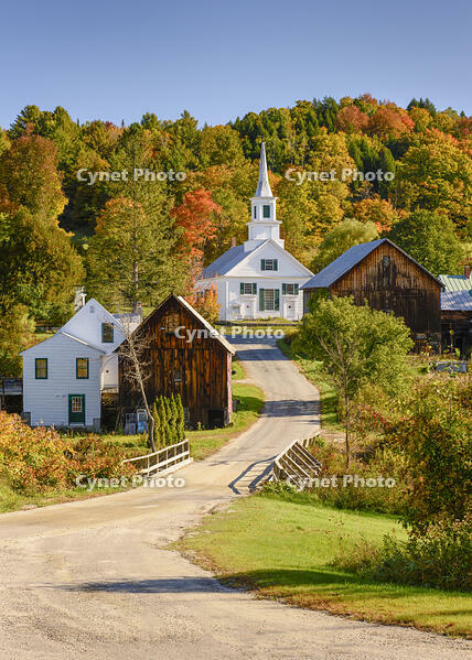 Autumn over road with white-steeple church and red barn, Green Mountains, Waits River, Vermont, USA [AWL110001505]