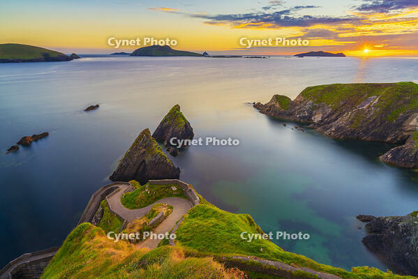 Ireland, Co.Kerry, Dingle, Slea Head, Dunquin Pier towards Blasket Islands at sunset [AWL110001555]