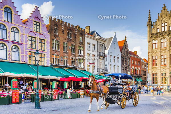 Tourists sitting in cafe on Bruges main square, Belgium [AWL110001901]