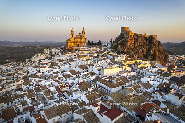 Traditional white village of Olvera with the cathedral and the castle seen at sunrise, drone picture, Andalusia, Spain [AWL110001906]