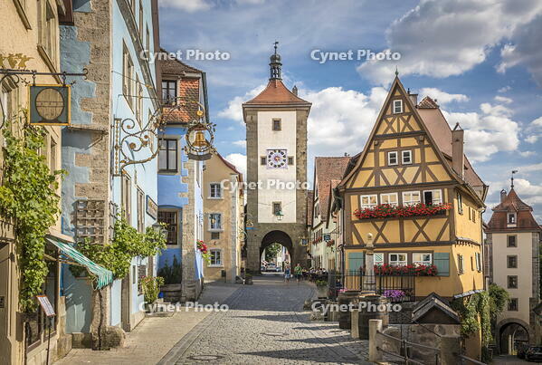 Historic houses and Spitaltor in Untere Schmiedgasse in the old town of Rothenburg ob der Tauber, Middle Franconia, Bavaria, Germany [AWL110001921]