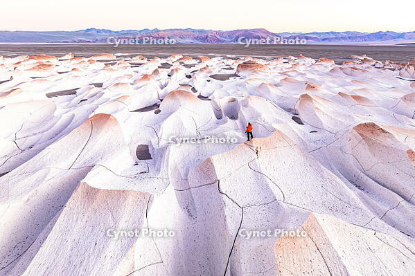 Man watching sunrise over the volcanic rock formations, Campo de Piedra Pomez, El Penon, Catamarca, Argentina. (MR) [AWL110002076]