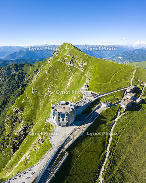 Aerial view of the Monte Generoso and Mario Botta's Fiore di Pietra restaurant on the top of the mountain. Rovio, Lake Ceresio, Canton Ticino, Switzerland. [AWL110002139]