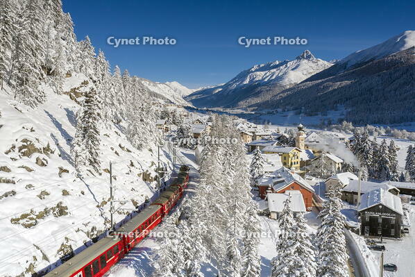 Bernina Express passes in Madulain, Graubunden, Maloja, Switzerland, Europe [AWL110002177]