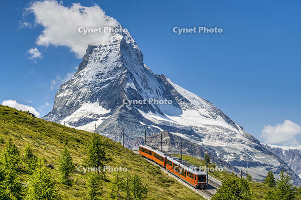 Train along the Gornergrat mountain rack railway with Matterhorn in the foreground, Zermatt, Valais, Switzerland [AWL110002256]