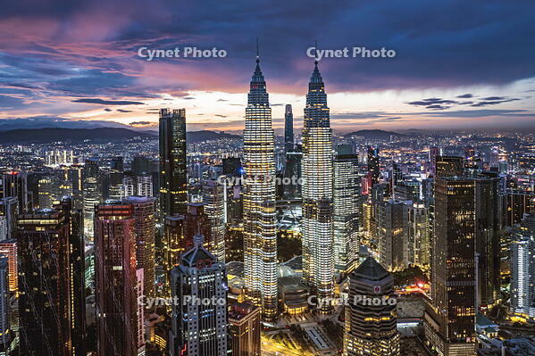 Aerial view of KLCC skyline with Petronas Twin Towers at dawn, Kuala Lumpur, Malaysia [AWL110002457]