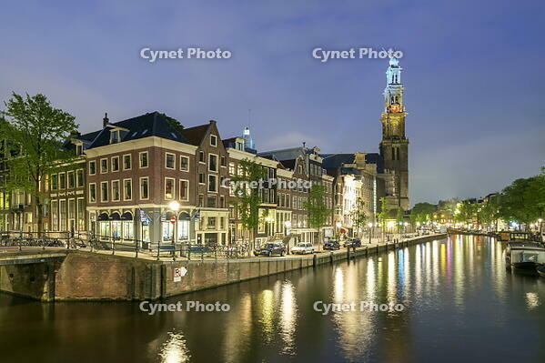 Intersection of Prinsengracht and Leidsegracht canals and tower of Westerkerk church at night, Amsterdam, North Holland, Netherlands [AWL110002470]
