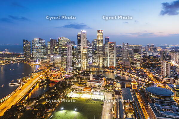 Elevated view of business district at sunset, Singapore [AWL110002489]