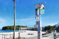 白良浜の地震津波の避難看板と緊急用のホーンスピーカー　 [THI110053289]