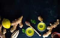 Detox drink with organic lemon, ginger and mint on dark background with copy space [IBR123380207]