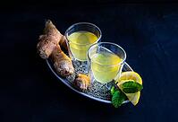 Detox drink with organic lemon, ginger and mint on dark background with copy space [IBR123380208]