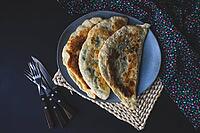 Traditional azerbaijan cuisine flat bread with herbs kutaby [IBR123380212]