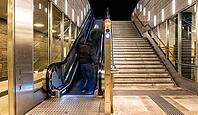 Night photo, long exposure with motion blur, modern underground entrance at Unter den Linden station, contemporary design with stairs and escalator, Berlin, Germany [IBR112672577]
