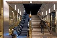 Night photo, long exposure with motion blur, modern underground entrance at Unter den Linden station, contemporary design with stairs and escalator, Berlin, Germany [IBR112672578]