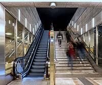 Night photo, long exposure with motion blur, modern underground entrance at Unter den Linden station, contemporary design with stairs and escalator, Berlin, Germany [IBR112672579]